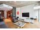 Inviting living room space with contemporary furnishings, hardwood floors, and natural light at 943 Peachtree Ne St # 902, Atlanta, GA 30309