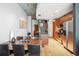 Open-concept layout combining dining area and kitchen with stainless steel appliances and breakfast bar at 943 Peachtree Ne St # 902, Atlanta, GA 30309