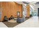 Stylish lobby with modern seating, wood accents, and elegant decor for a welcoming atmosphere at 943 Peachtree Ne St # 902, Atlanta, GA 30309