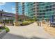 Beautiful patio with comfortable seating, dining area, and well-maintained landscaping at 943 Peachtree Ne St # 902, Atlanta, GA 30309