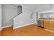 Well-lit kitchen area with stainless steel dishwasher and wooden floors at 3044 Lauren Parc Rd, Decatur, GA 30032