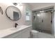 Modern bathroom features sleek vanity, frameless shower, and updated fixtures at 3480 Tanbark Ne Ct, Brookhaven, GA 30319