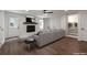 Inviting living room featuring a cozy fireplace, ample seating and hardwood floors at 3480 Tanbark Ne Ct, Brookhaven, GA 30319
