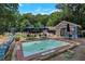 Community pool area with shade umbrellas and ample seating for relaxation at 3480 Tanbark Ne Ct, Brookhaven, GA 30319