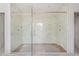 A spacious bathroom with a large glass shower enclosure at 3118 Lanier Ne Dr, Brookhaven, GA 30319
