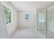 Modern bathroom with tiled shower, bright natural light, and clean, minimal design at 3118 Lanier Ne Dr, Brookhaven, GA 30319
