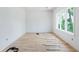 Cozy bedroom with hardwood floors, large windows, and natural light at 3118 Lanier Ne Dr, Brookhaven, GA 30319