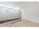This bedroom boasts hardwood floors and multiple windows for ample natural light at 3118 Lanier Ne Dr, Brookhaven, GA 30319