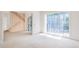 Bright, airy living room with large windows and modern details at 3118 Lanier Ne Dr, Brookhaven, GA 30319