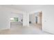 Open-concept living room with sleek white walls and modern archways at 3118 Lanier Ne Dr, Brookhaven, GA 30319