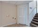 Basement featuring stairs, closet, and unfinished walls at 6708 Bedford Rd, Rex, GA 30273