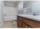 Full bathroom with vanity and combined tub and shower at 6708 Bedford Rd, Rex, GA 30273