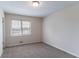 Comfortable bedroom with neutral carpet, a window providing natural light at 6708 Bedford Rd, Rex, GA 30273