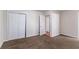 Spacious bedroom featuring carpet and a closet with sliding doors at 6708 Bedford Rd, Rex, GA 30273