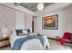 Comfortable bedroom featuring a plush bed, stylish decor, and ample natural light at 943 Peachtree Ne St # 814, Atlanta, GA 30309