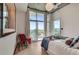 Bright bedroom with floor-to-ceiling windows, modern decor, and comfortable furnishings at 943 Peachtree Ne St # 814, Atlanta, GA 30309