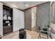 Dressing room with patterned sliding doors, a closet, and decorative accents at 943 Peachtree Ne St # 814, Atlanta, GA 30309