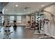 Bright gym features weightlifting and strength training equipment at 943 Peachtree Ne St # 814, Atlanta, GA 30309