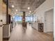 Spacious kitchen with stainless steel appliances, concrete ceiling, hardwood floors, and a scenic view at 943 Peachtree Ne St # 814, Atlanta, GA 30309