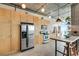 Spacious kitchen featuring modern appliances, ample cabinetry, and a center island with barstool seating at 943 Peachtree Ne St # 814, Atlanta, GA 30309
