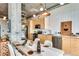 Open kitchen featuring stainless steel appliances, minimalist cabinets, and unique pendant lighting at 943 Peachtree Ne St # 814, Atlanta, GA 30309