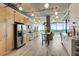 Open kitchen featuring modern appliances, ample cabinetry, and a center island with barstool seating at 943 Peachtree Ne St # 814, Atlanta, GA 30309