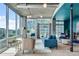 Cozy living room with plush seating, modern lighting, and expansive windows at 943 Peachtree Ne St # 814, Atlanta, GA 30309