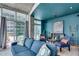 Cozy and stylish living room featuring comfortable seating and city views at 943 Peachtree Ne St # 814, Atlanta, GA 30309
