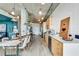 Modern living space featuring an open floor plan with a dining area and a sleek, updated kitchen at 943 Peachtree Ne St # 814, Atlanta, GA 30309