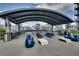 Outdoor lounge features seating, grills, and city views from the rooftop at 943 Peachtree Ne St # 814, Atlanta, GA 30309