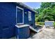 The home's exterior features a staircase leading to a garden and outdoor space, ideal for relaxation and entertaining at 1190 Francis Nw St, Atlanta, GA 30318