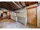 Large basement with shelving, cabinetry, and unfinished space, perfect for storage or customization at 1190 Francis Nw St, Atlanta, GA 30318