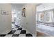 Hallway view to modern kitchen and bright, stylish dining room at 1190 Francis Nw St, Atlanta, GA 30318