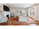 Bright living room featuring a fireplace, hardwood floors, and comfortable seating arrangement at 1190 Francis Nw St, Atlanta, GA 30318