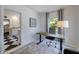 Home office featuring a wooden desk, neutral walls and carpet, and plenty of natural light at 1190 Francis Nw St, Atlanta, GA 30318
