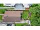 An aerial view of a private backyard featuring a well-maintained yard and patio with lovely landscaping at 1190 Francis Nw St, Atlanta, GA 30318