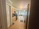 Kitchen with tile floor, stainless steel appliances, and bright window views at 148 Parkside Dr, Stockbridge, GA 30281