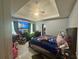 Main bedroom boasts tile floors, a ceiling fan, tray ceilings, and plenty of space at 148 Parkside Dr, Stockbridge, GA 30281