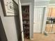 View of pantry with storage shelves, and tile flooring near kitchen cabinets at 148 Parkside Dr, Stockbridge, GA 30281