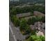 Aerial view of property, showcasing proximity to Roswell Road, surrounding neighborhood and trees at 200 Mystic Ct, Atlanta, GA 30342