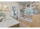 Bright ensuite bathroom featuring a soaking tub, a separate shower, and dual vanity sinks at 200 Mystic Ct, Atlanta, GA 30342