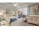 Spacious bedroom area featuring a crib and desk with neutral color palette at 200 Mystic Ct, Atlanta, GA 30342