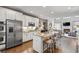 Spacious kitchen with granite island, stainless steel appliances, and a view into the living room at 200 Mystic Ct, Atlanta, GA 30342