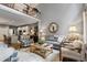 Open-concept living room features hardwood floors, neutral walls, and flows into the kitchen at 200 Mystic Ct, Atlanta, GA 30342