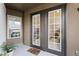 The patio has neutral walls and an area rug, as well as potted plants at 901 Abernathy Ne Rd # 5140, Sandy Springs, GA 30328
