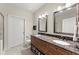 Elegant bathroom featuring double sinks, granite countertops, and ample storage space for all your essentials at 901 Abernathy Ne Rd # 5140, Sandy Springs, GA 30328