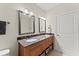 Well-lit bathroom with double sinks, granite countertops, and modern fixtures providing a luxurious experience at 901 Abernathy Ne Rd # 5140, Sandy Springs, GA 30328