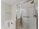 Clean bathroom design, with a combined shower and tub space, featuring subway tiles and modern hardware at 901 Abernathy Ne Rd # 5140, Sandy Springs, GA 30328