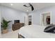 Spacious bedroom with a TV, a plant, and closet access offering a relaxing and functional layout at 901 Abernathy Ne Rd # 5140, Sandy Springs, GA 30328