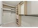 Organized walk-in closet with ample shelving and hanging space, providing storage for clothing and accessories at 901 Abernathy Ne Rd # 5140, Sandy Springs, GA 30328